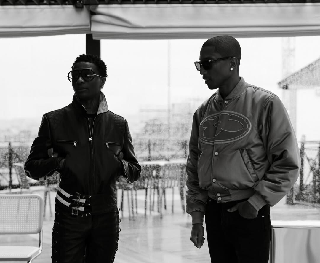 Wizkid in Head-to-Toe Leather and Pharrell in a Satin Bomber